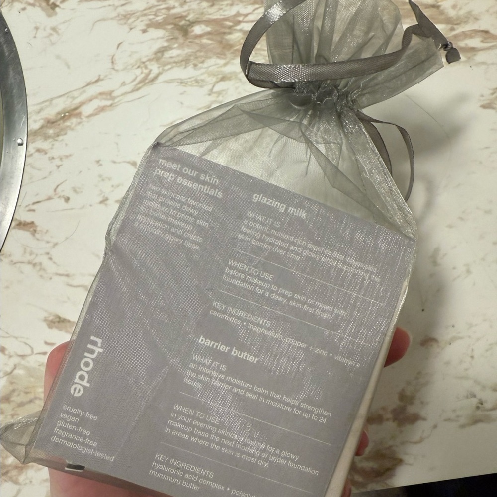 RHODE Skincare Essentials in Silver Bag - Picture 3 of 4